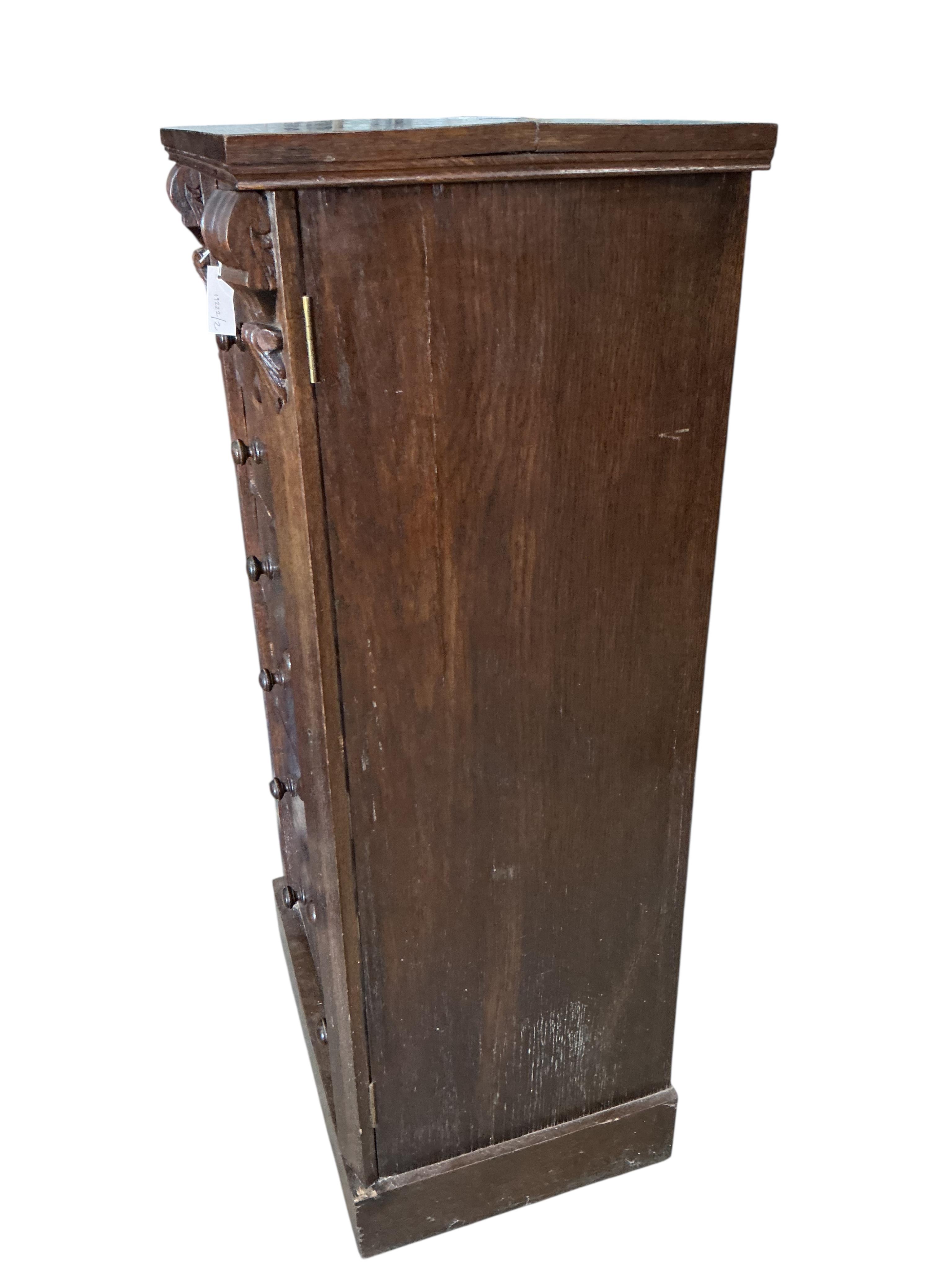 A late Victorian oak Wellington chest, width 61cm, depth 43cm, height 121cm